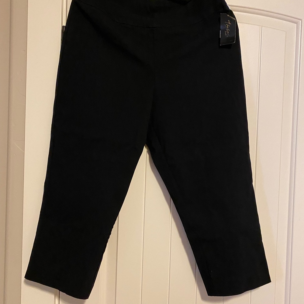 Thalia Sodi black stretchy capris with slit in back with gold accent